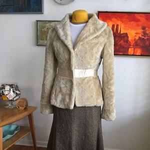 Cream faux fur jacket.